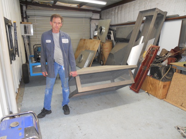 See owner working on preparing elements of roofing job