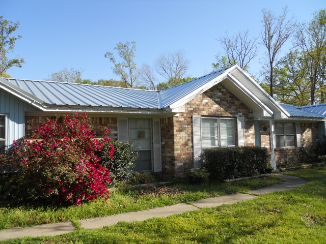 Alternative shot of metal reroofing job completed by Grumbles